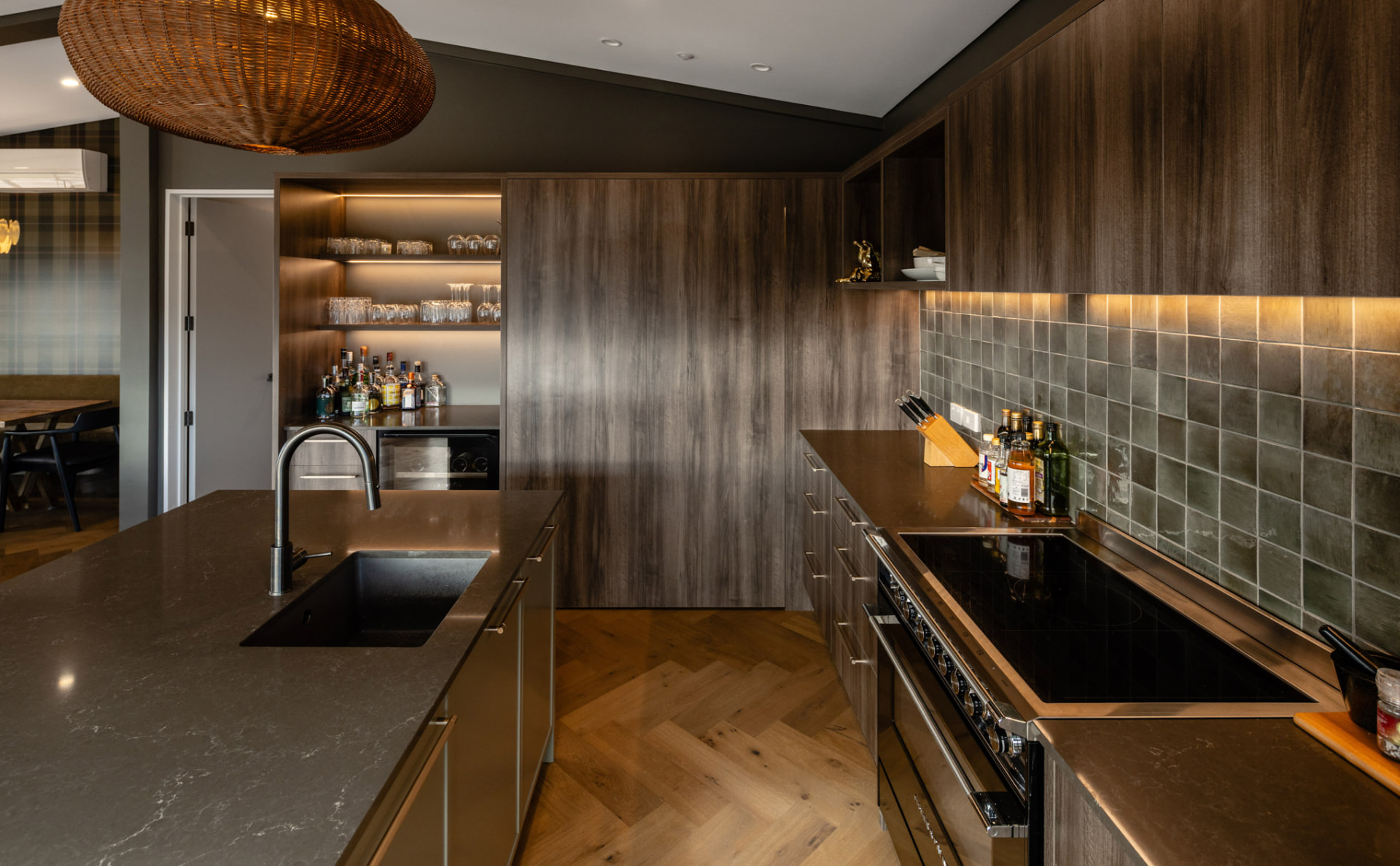 Kitchen bench and drinks bar at Whakahā